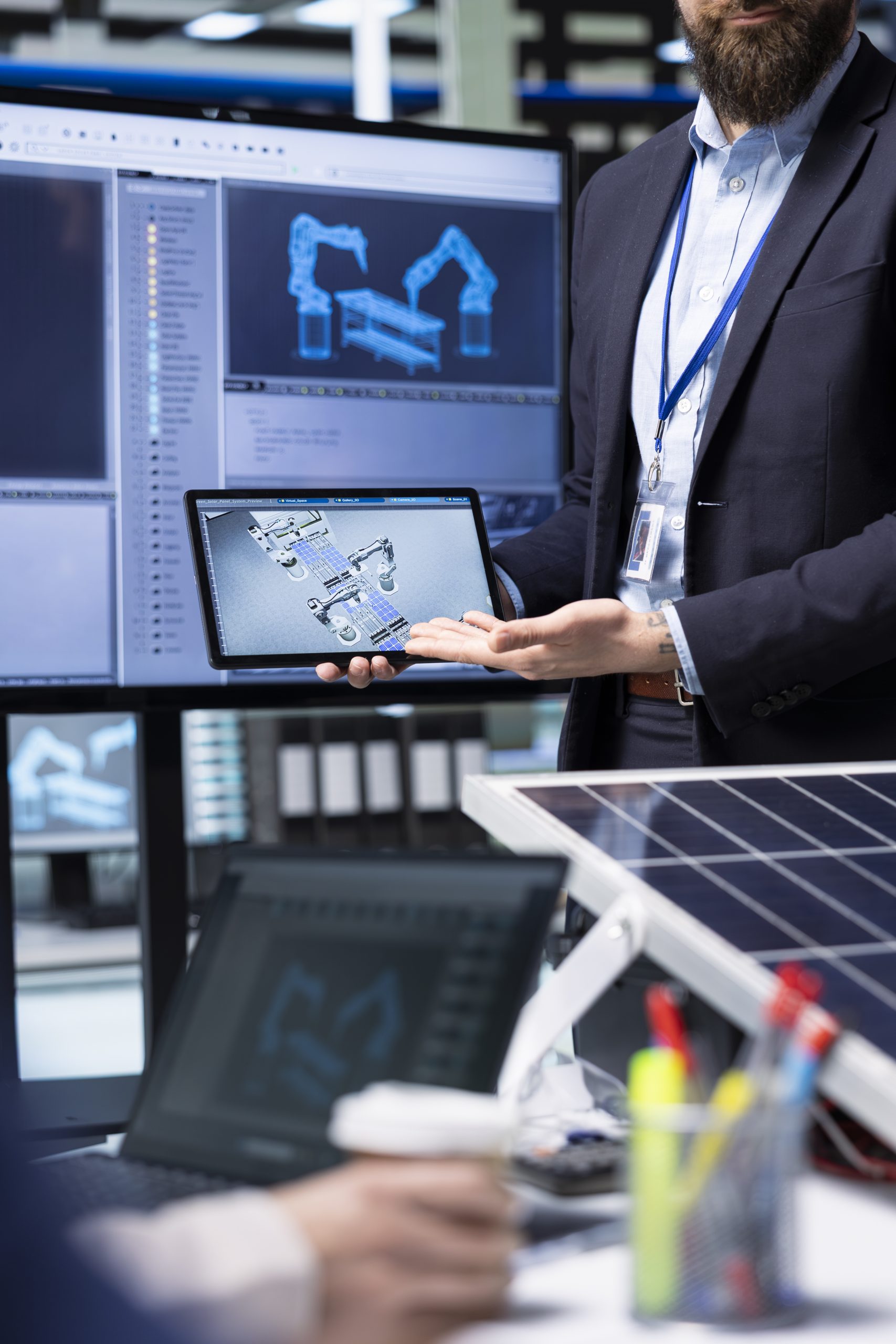 Home shareholders planning factory upgrades using cad software on devices